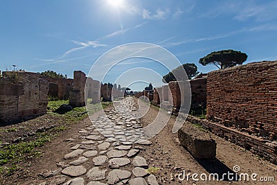 Ancient Roman road paved with stones for carriage. Decumano maxi Stock Photo