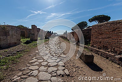 Ancient Roman road paved with stones for carriage. Decumano maxi Stock Photo