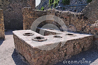 Ancient Roman snackbar in Herculaneum Italy Stock Photo