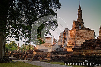 Ancient ruin temple and pagoda at Sukhothai Historical Park Stock Photo