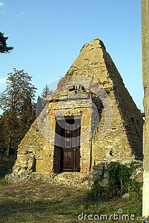 Ancient Ruins of pyramid iron door entrance Stock Photo