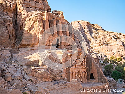 Ancient ruins of the burial complex carved into rocks called Obelisk tomb, in Petra Jordan Stock Photo