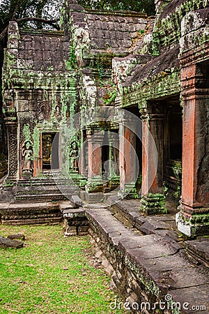 Ancient ruins in Ta Prohm or Rajavihara Temple at Angkor, Siem R Stock Photo