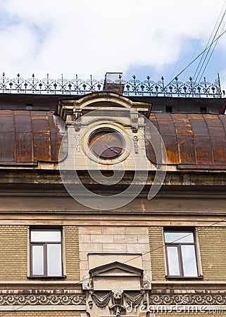 Ancient rusty clock at roof Stock Photo