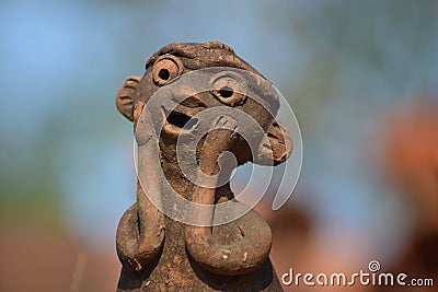 Ancient sculpture expressing surprise Stock Photo