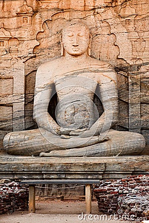 Ancient sitting Buddha image Stock Photo