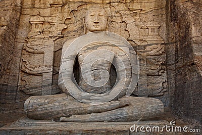 Ancient sitting Buddha image Stock Photo