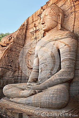 Ancient sitting Buddha image Stock Photo