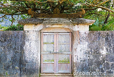 An ancient small door in Shuri castle in Okinawa, Japan Stock Photo