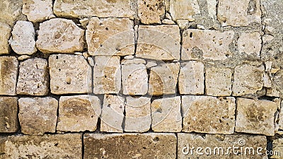 Ancient square sandstones wall Stock Photo