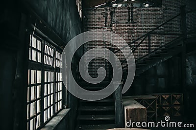 An ancient staircase in a room in an abandoned house. Stock Photo