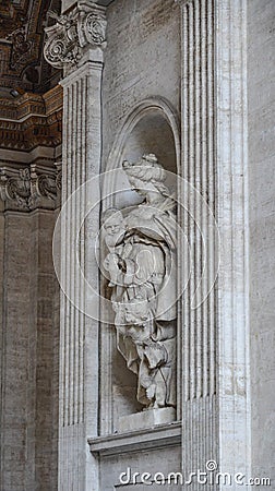 Ancient statue of the St Peter Basilica Stock Photo