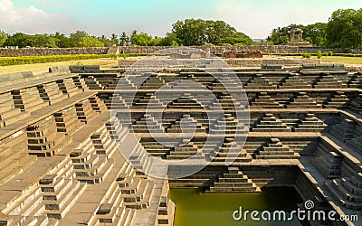 The ancient step well in Hampi India Stock Photo