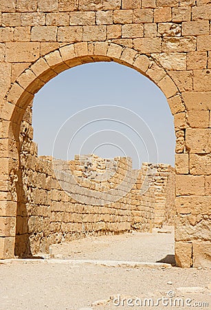 Ancient stone arch and wall Stock Photo