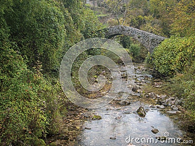 Ancient stone bridge just outside Equi Terme, Lunigiana, medieval spa village in Tuscany, Italy famous for its sulphur Stock Photo