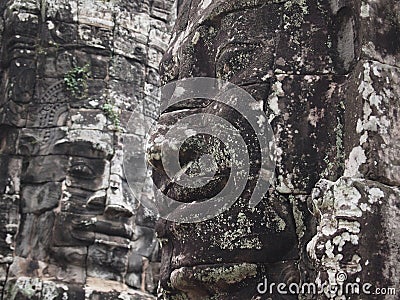 Ancient stone Buddha face closeup. Stock Photo