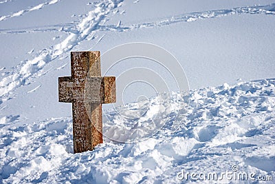 Ancient Stone Christian Cross in the Snow - Altopiano della Lessinia Veneto Italy Stock Photo