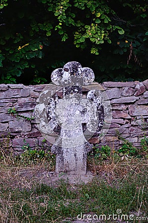 Ancient stone cross in Pirogov museum Stock Photo