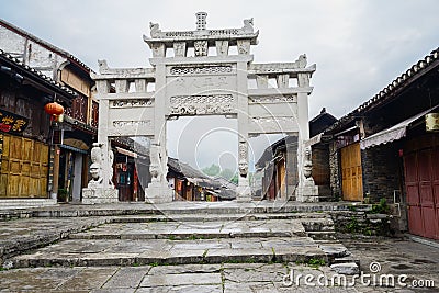 Ancient stone memorial gateway in cloudy early morning Editorial Stock Photo