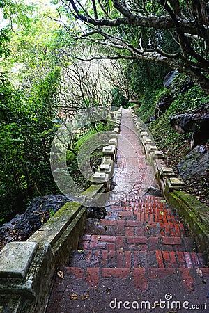 Ancient brick and stone stairway on Mount Phousi in Luang Prabang, Laos Stock Photo