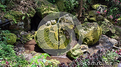 Ancient stonework at Goa Gajah Sanctuary Ubud Stock Photo