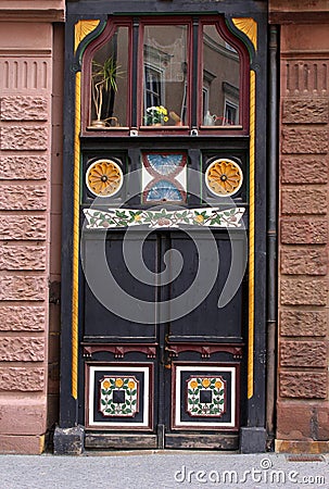 Ancient street-door with decorations in Eisenach, Germany Stock Photo