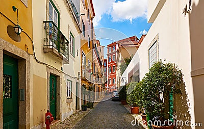 Ancient street of Lisbon old town Stock Photo