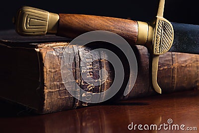 One Hundred Fifty Year Old Bible with Sword Stock Photo