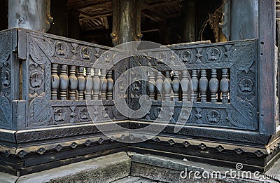 Ancient teak wood carving Stock Photo