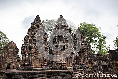 Ancient temple Banteay Srei view, Angkor Wat, Cambodia. Stone carved decor on hindu temple. Cambodian place of interest. Stock Photo