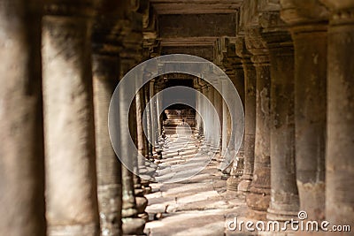 Ancient Temple Pillars Under a Walkway in Angkor Thom, Cambodia Stock Photo