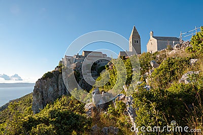 Ancient town of Lubenice and cliff in Cres Stock Photo