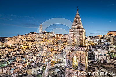 Ancient town of Matera at dusk, Basilicata, Italy Stock Photo