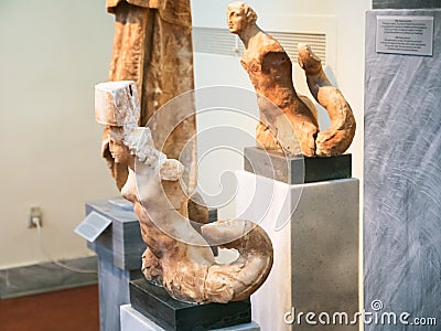 Ancient triton statues in Archaeological Museum Editorial Stock Photo