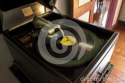 Old turntable On the wooden table Stock Photo