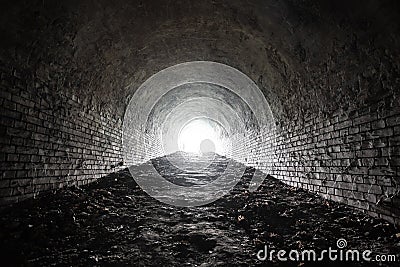 Ancient underground brick tunnel of the fortress. Interior of fort potern of 19th century Stock Photo