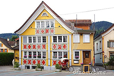 Ancient unique colourful house in historic medieval old town. Appenzell is well-known for its colourful houses with painted facade Editorial Stock Photo