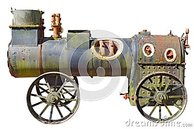 An ancient very small steam locomotive used in agriculture a hundred years ago isolated Stock Photo