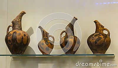 Ancient vessels from the Neolithic period: Heraklion Archaeological Museum exhibit from 6000 BCE to the pre-Palatial period Editorial Stock Photo