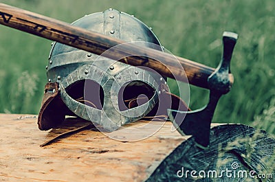 Ancient Viking armor. Helmet and ax. Close-up. Historical photo concept Stock Photo