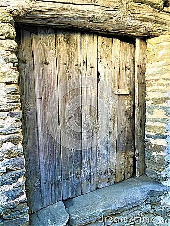 Ancient and vintage door, beam, charm and history Stock Photo