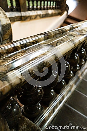 Ancient vintage marmoreal marble stairs with balusters in daylight Stock Photo