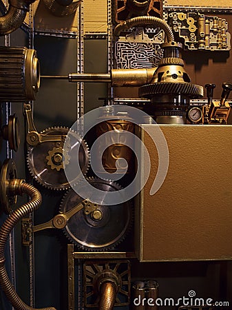 An ancient vintage wall with mechanisms in the steampunk style. Stock Photo