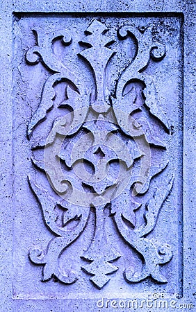 Ancient violet stone plate with ornament Stock Photo