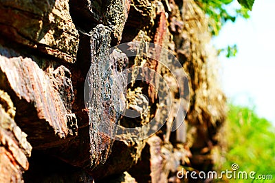 Ancient wall made of large stones of iron ore bonded Stock Photo