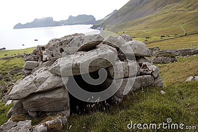 Ancient wall structures and shelters, i.e. cleits, on the remote archipelago of St Kilda, Outer Hebrides, Scotland Stock Photo