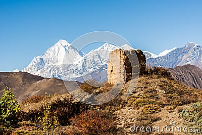 Ancient watch tower with mountain scenery. Stock Photo