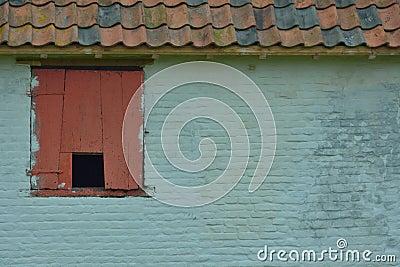 Ancient window at a farm Stock Photo