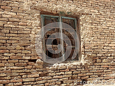 Aged Window in a Brick Wall Stock Photo
