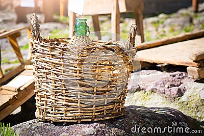 Ancient wine damask of wicker Stock Photo